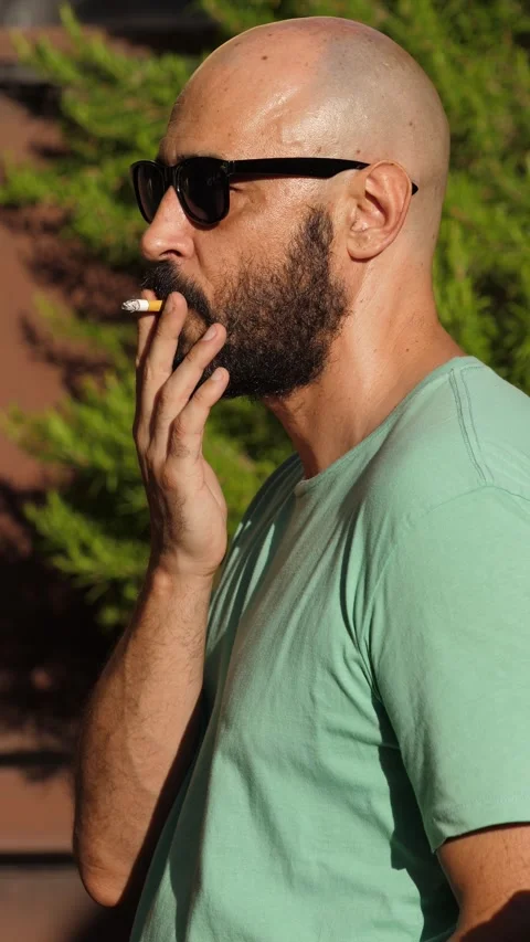 man smoking cigarette video Outdoors - 4K stock Smoking a Cigarette, but the