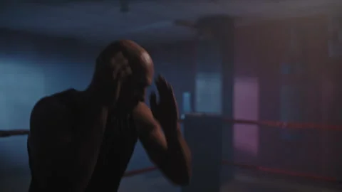 A Bald man on a boxing training Stock Footage 258264292