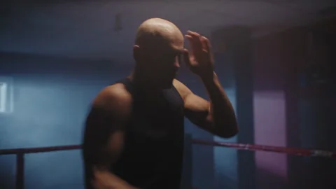 Bald man on a boxing training Video stock 258270246
