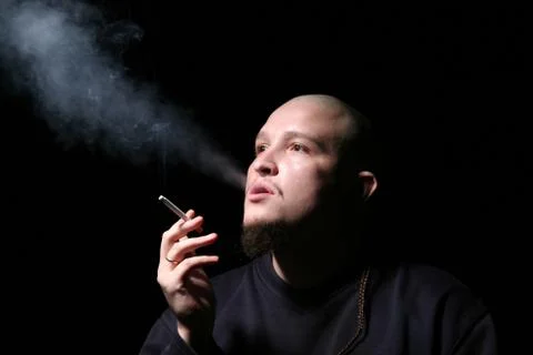 The bald man with a cigarette Foto stock