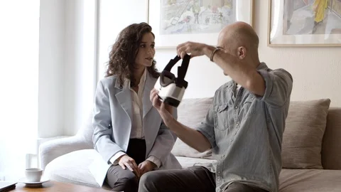 Bald man enjoying VR experience at home Video stock 121003290