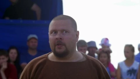 Bald man explains something to his interlocutor Stock Footage 82407371