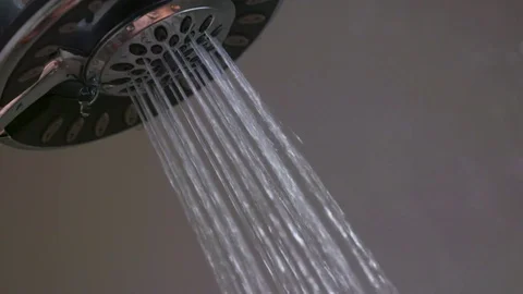 Bald man having a shower Stock Footage 83187791