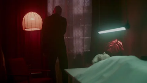 A bald man looking at the corpse on the table Video stock 259853468