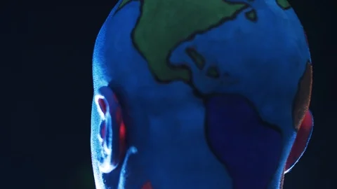 Bald man in makeup of planet earth Stock Footage 119500084