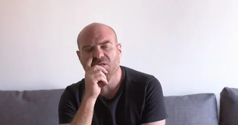 Bald Man with Red Goatee Thinking and Looking Around with Eyes Stock Footage 295143795