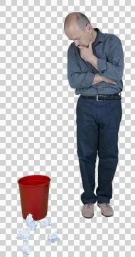 A bald man stands with his arms crossed, looking down thoughtfully at a red.. Stock Photos
