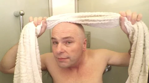Bald man with towel. Video stock 58752589