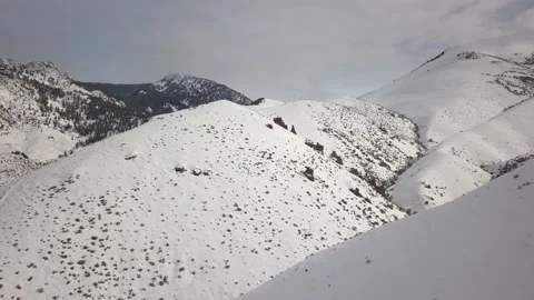Bald snow-covered mountains Stock Footage 166104402