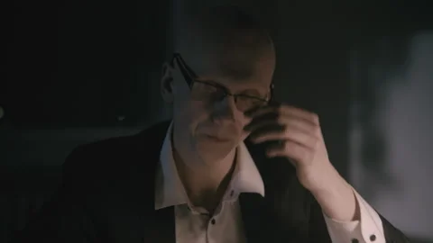 A bald Stressed accountant dealing with paperwork Stock Footage 258484194