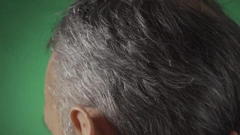 The balding head of a gray-haired man Stock Footage 256745399