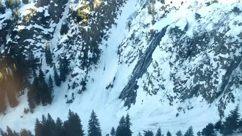Balea Waterfall seen from the cable car during a winter descent, surrounded Stock Footage 125999586