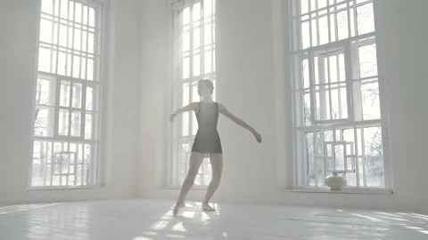 Balerina whirling around herself in the ballet studio. Stock-Footage 127621153