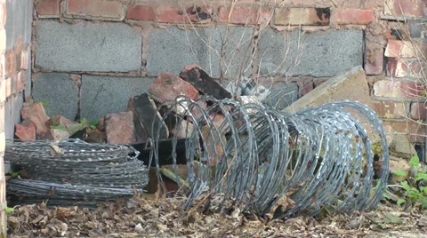 Bales of barbed wire, cut away shot Stock Footage 37164493