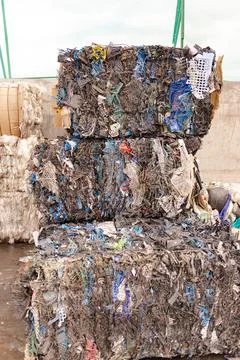 Bales of pressed plastic fruit boxes Stock Photos