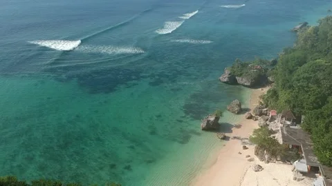 Bali Beach and Cliff Pan Shot Stock Footage