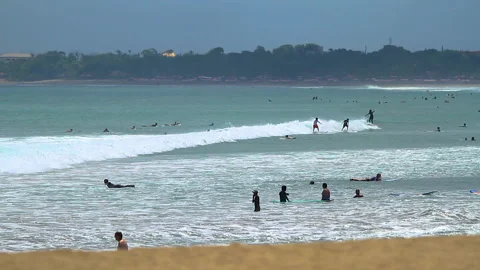Bali Beach with Surfers Stock Footage 146936124