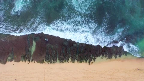 Bali - Big ocean waves hitting a rocky beach. Stock Footage 134680579