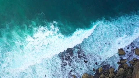 Bali - Big ocean waves hitting a rocky beach. Stock Footage 134682180