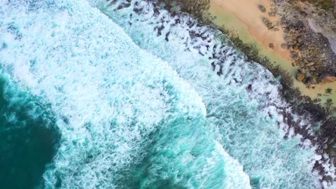 Bali - Big ocean waves hitting a rocky beach. Stock Footage 134682934