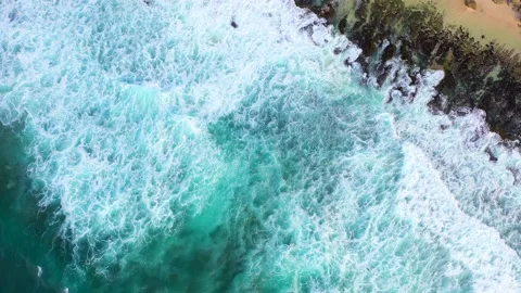 Bali - Big ocean waves hitting a rocky beach. Stock Footage 134682969