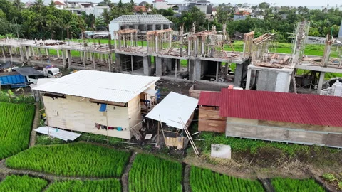 Bali Builders and Rice fields Stock Footage 326015855