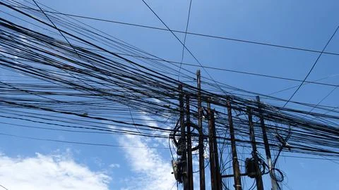Bali MARCH 2024 - Absolute cable chaos on power pole in Bali, Indonesia Stock Photos