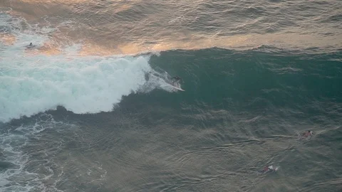 Bali surfer caught a big wave top view Stock Footage 126974766