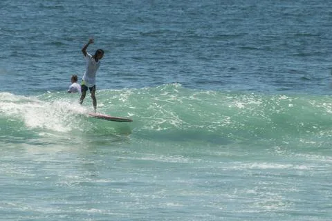 BALI SURFERS Stock Photos