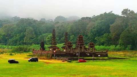 Bali temple on background scenery volcanic lake Bali, Indonesia 4K Stock Footage 300890938