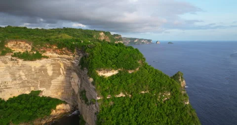 Bali temple on top of Banah limestone cliff Nusa Penida aerial drone Stock Footage 323325774
