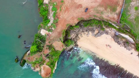 Bali - turquoise ocean hitting coral reef and rocky cliffs. Stock Footage 134683087