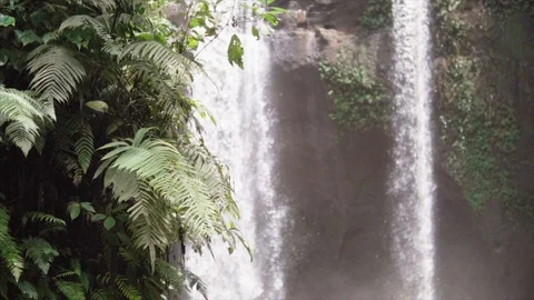 Bali Waterfall , water goind down with huge power in slowmotion, waterfall Stock Footage 85738486