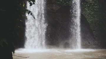 Bali Waterfall , water goind down with huge power in slowmotion, waterfall Stock Footage 85738593