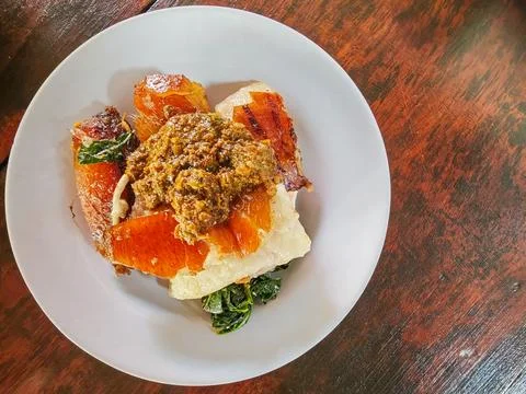 Balinese Babi Guling Crispy Roasted Pork Skin with Sambal Paste 写真素材