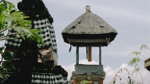 Balinese Bale Kulkul tower with poleng cloth Stock Footage 322150779