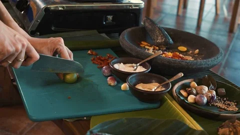 Balinese cooking class, cutting lime Stock-Footage 84949869