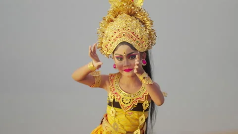 Balinese dancer dancing with dramatic expression and hand gestures, hinduism Stock Footage 265641414
