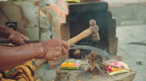 Balinese iron smith making tools traditional way in village, close up Video stock 68121842