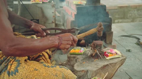 Balinese iron smith making tools traditional way in village, close up Stock Footage 68127659