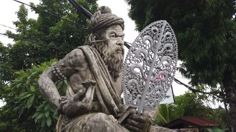 Balinese Statue of a Dalang, Puppeteer o... | Stock Video | Pond5