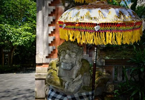 Balinese Stone Statue in a garden. Foto stock