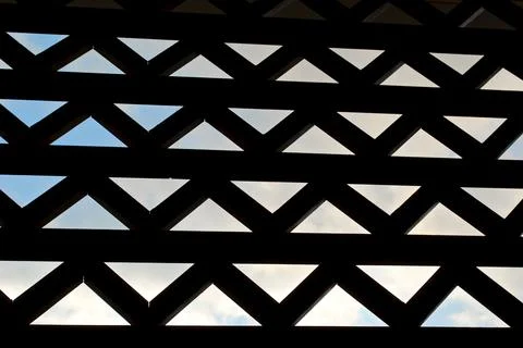 Balinese triangle pattern design, shadow, sky Stock Photos