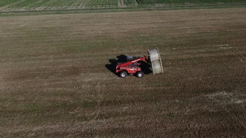 Baling machine at work Stock-Footage 129853520