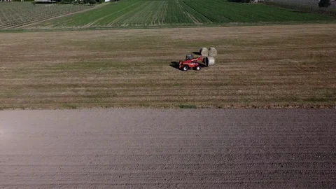 Baling machine at work Stock-Footage 129857400