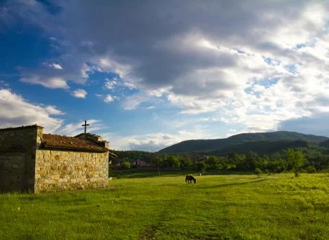 Balkan chapel on sunset Photos