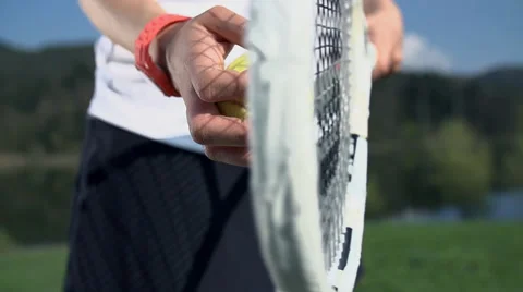 Ball and racket tapping in slow motion close up Stock Footage 39433562