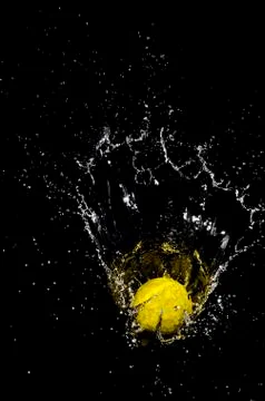 Ball and splash. Stock Photos
