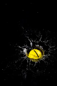 Ball and splash. Stock Photos