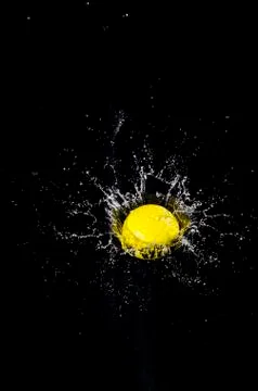 Ball and splash. Stock Photos